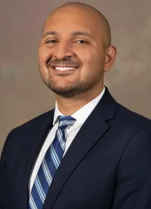 Dr. Sam Khan
