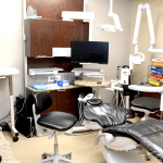 Fully equipped dental operatory with ergonomic chair, delivery system, and cabinetry